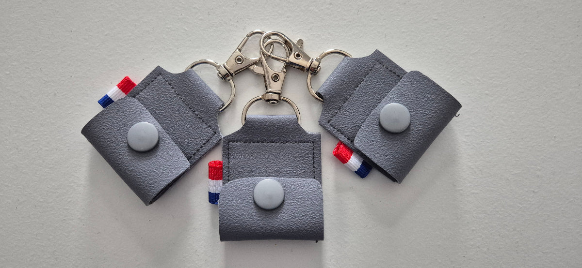 porte clé jeton gris